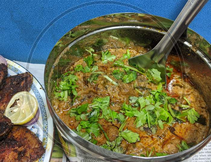 Indian curry garnished with coriander