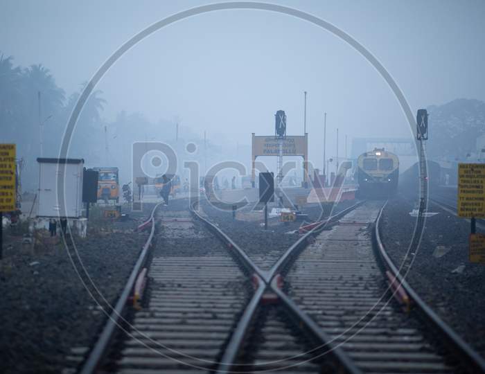 Railway Crossing With Railway Tracks At Palakollu Railway Station on an Winter Morning
