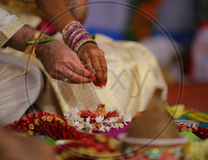 Indian Bride and Groom during puja