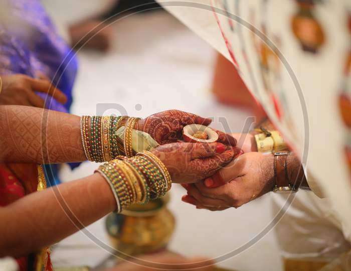 Indian bride during wedding puja