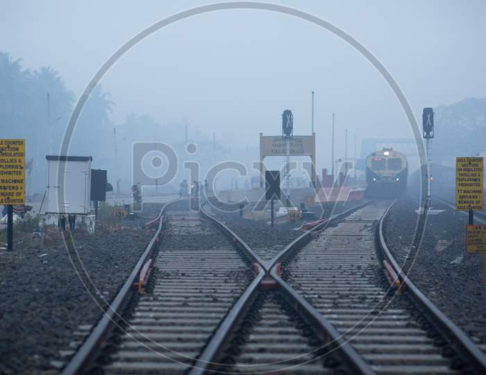 Railway Crossing With Railway Tracks At Palakollu Railway Station on an Winter Morning