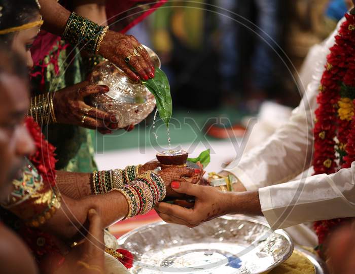 Indian Bride and Groom during wedding puja