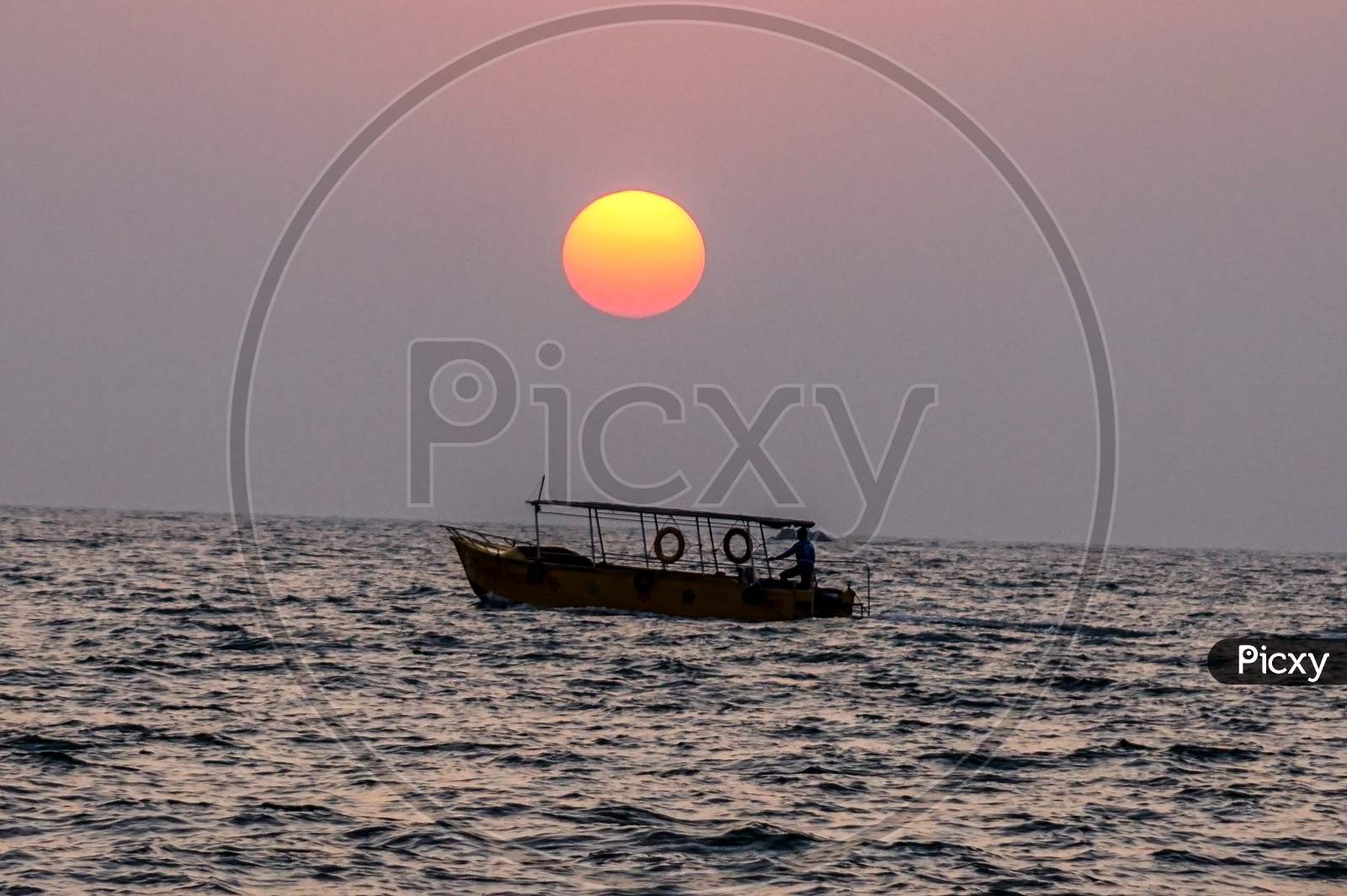 A Goan Ship during sunset