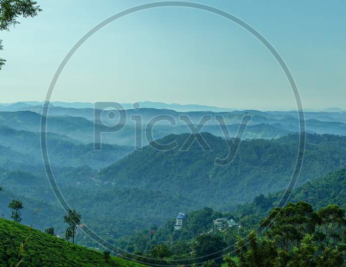 Landscape of mountain layers with vegetation