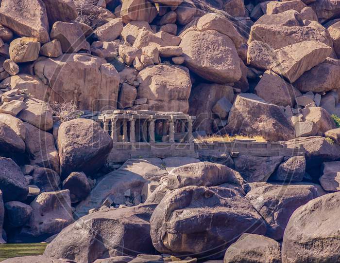 Ancient temple ruins on the boulders in Hampi