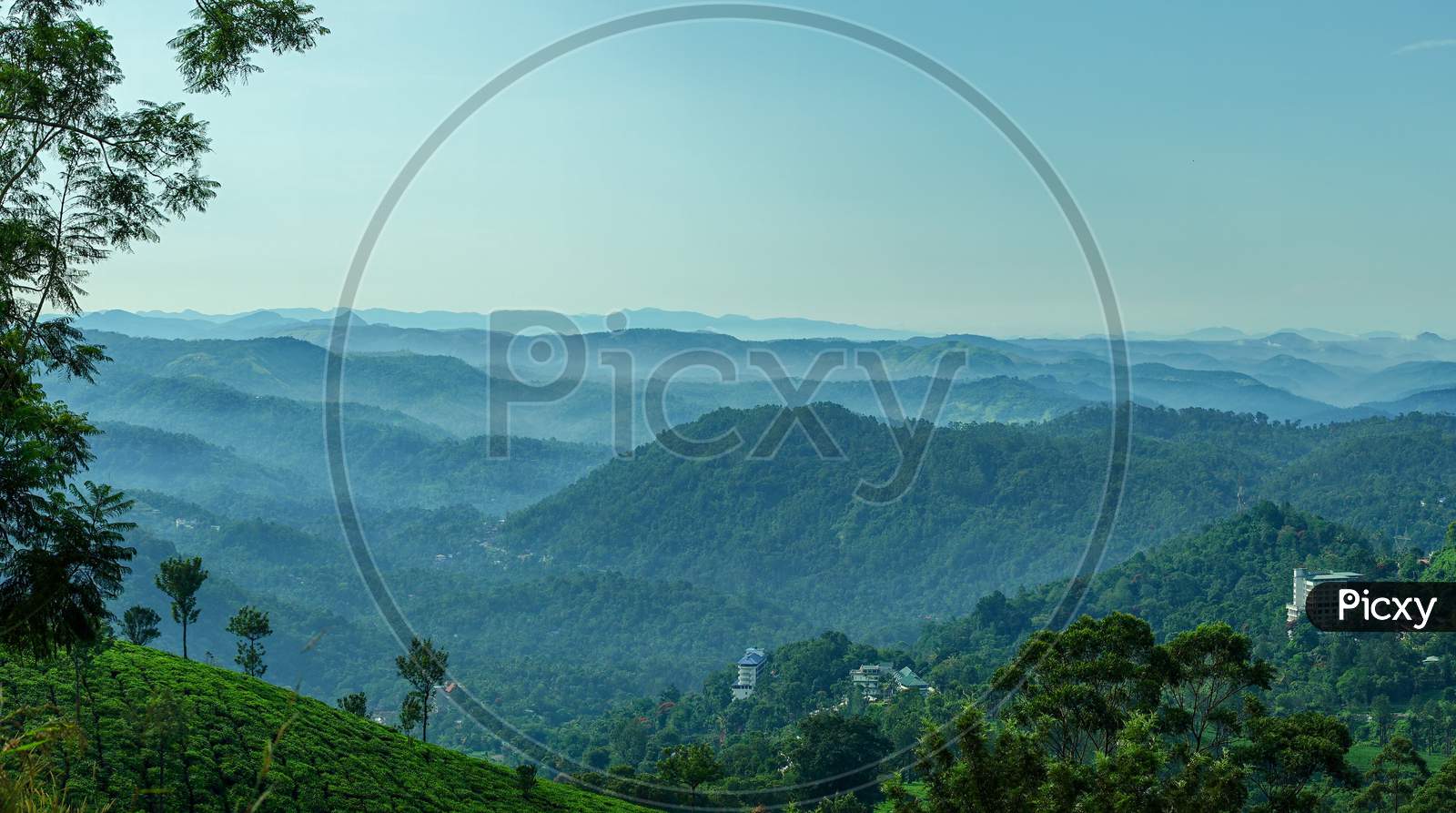 Landscape of mountain layers with vegetation
