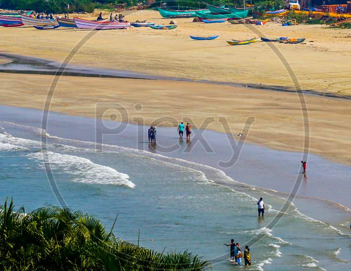 Aerial view of Indian Tourists by the Goa beach