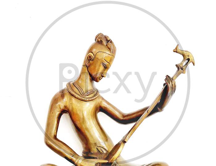 Brass Idols Of Indian Traditional Musicians  Over a White Background