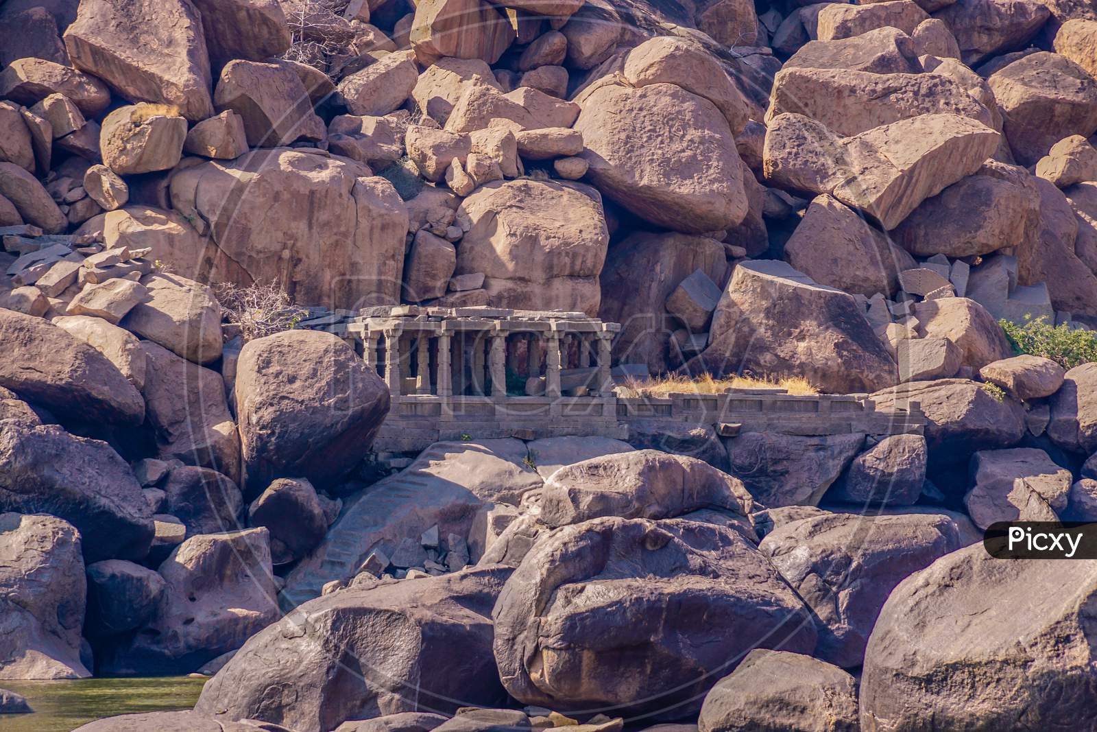 Ancient temple ruins on the boulders in Hampi