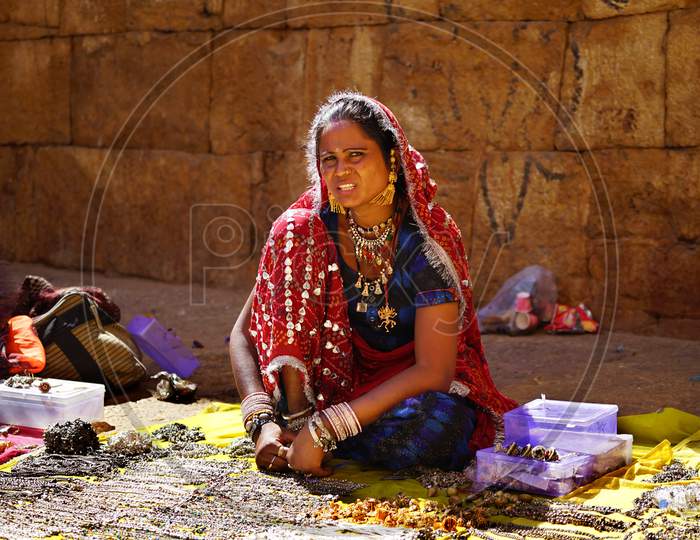 Indian Tribal Woman selling accessories
