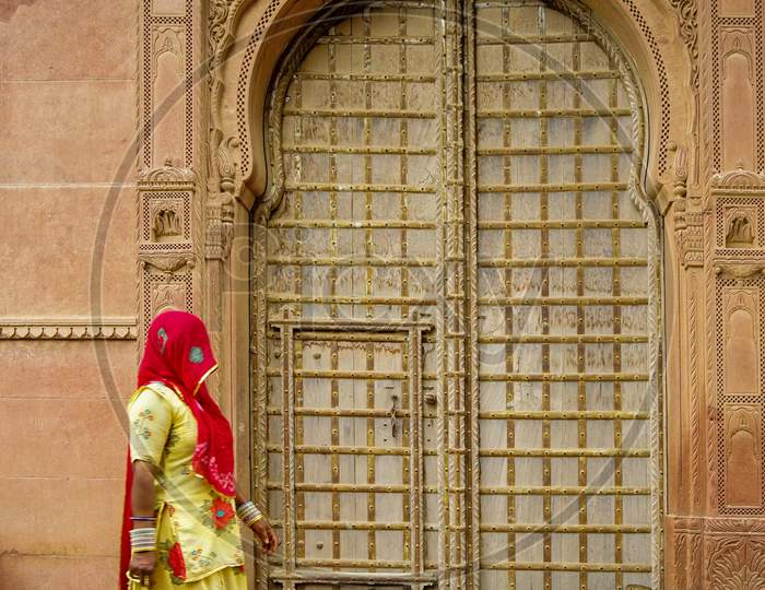 Rajasthani woman covering her face with scarf