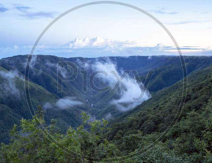 Landscape of mystic mountains with vegetation