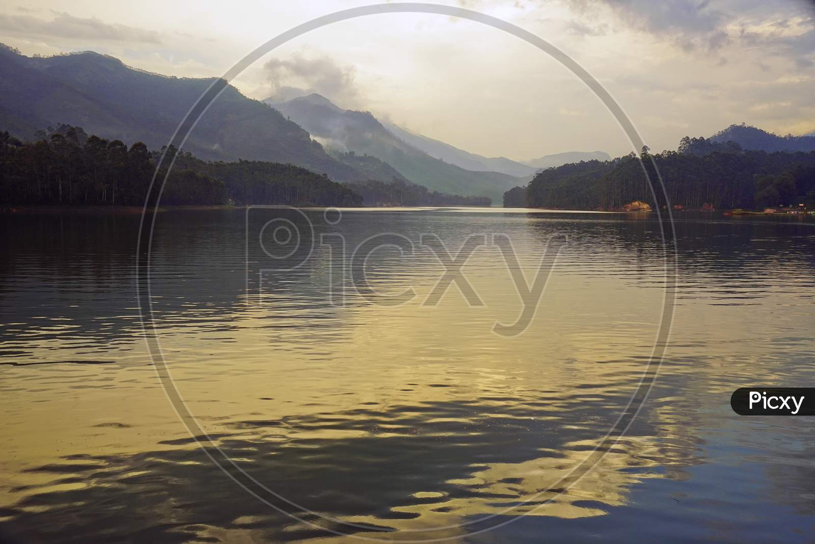 Landscape of calm lake with mountain layers