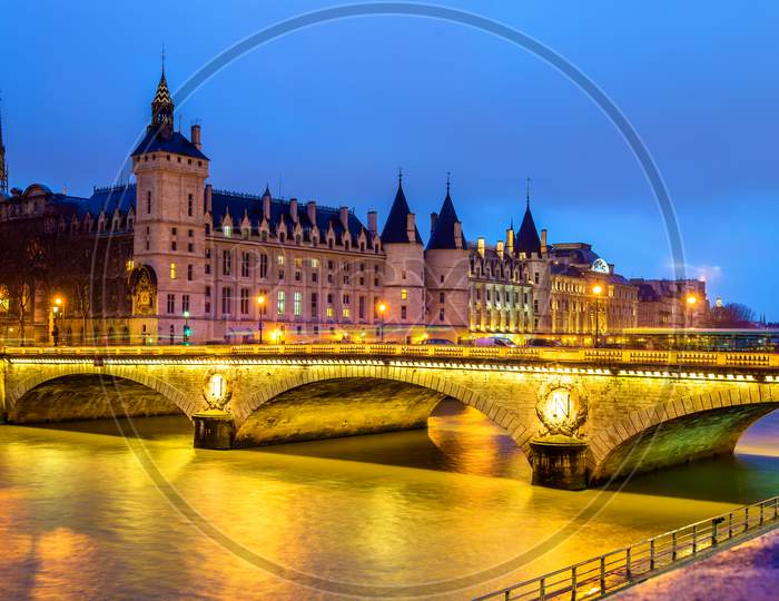 The Pont Au Change And The Conciergerie In Paris - France