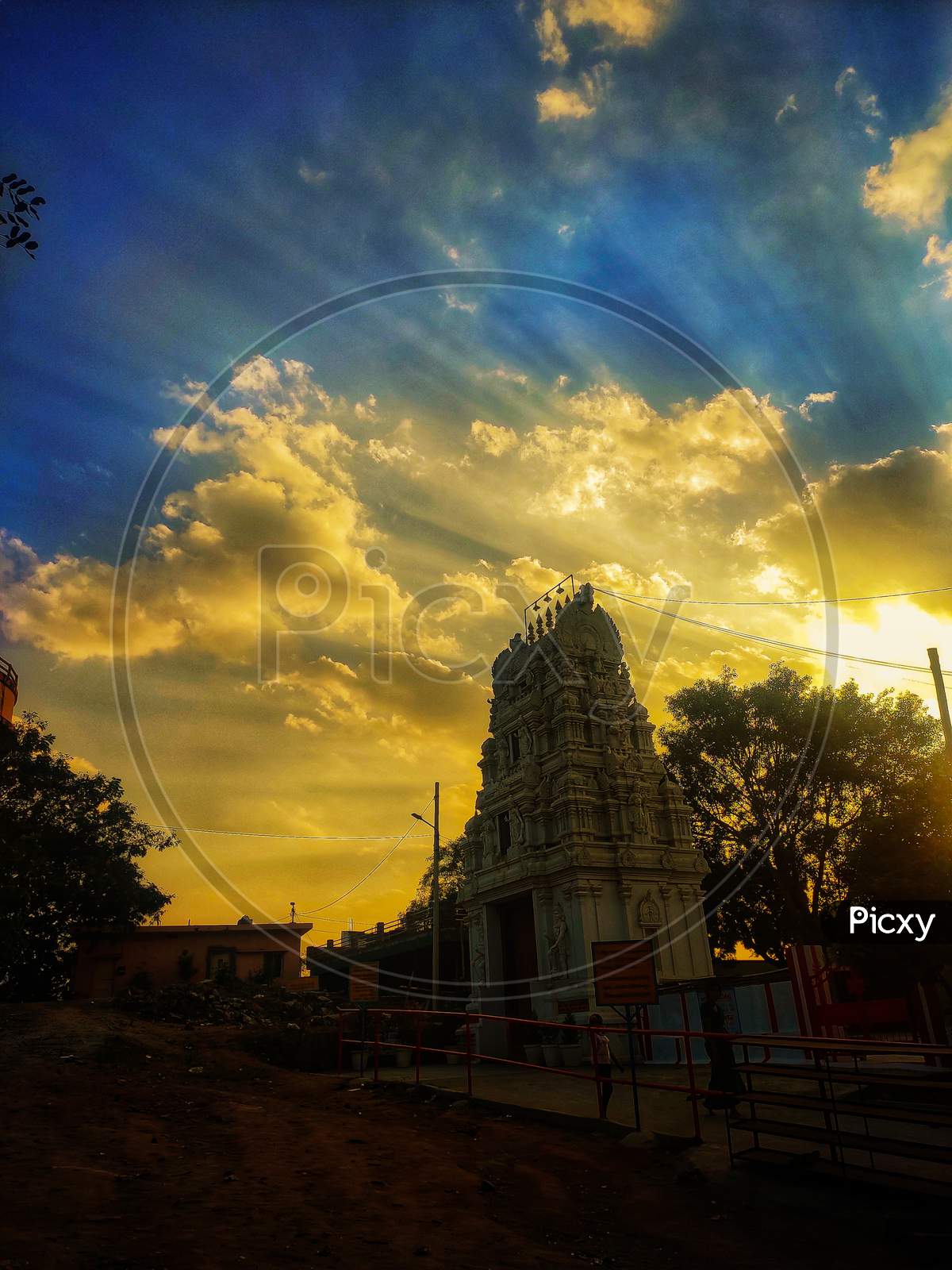 Hindu Temple Shrine With Sunset Sky In Background