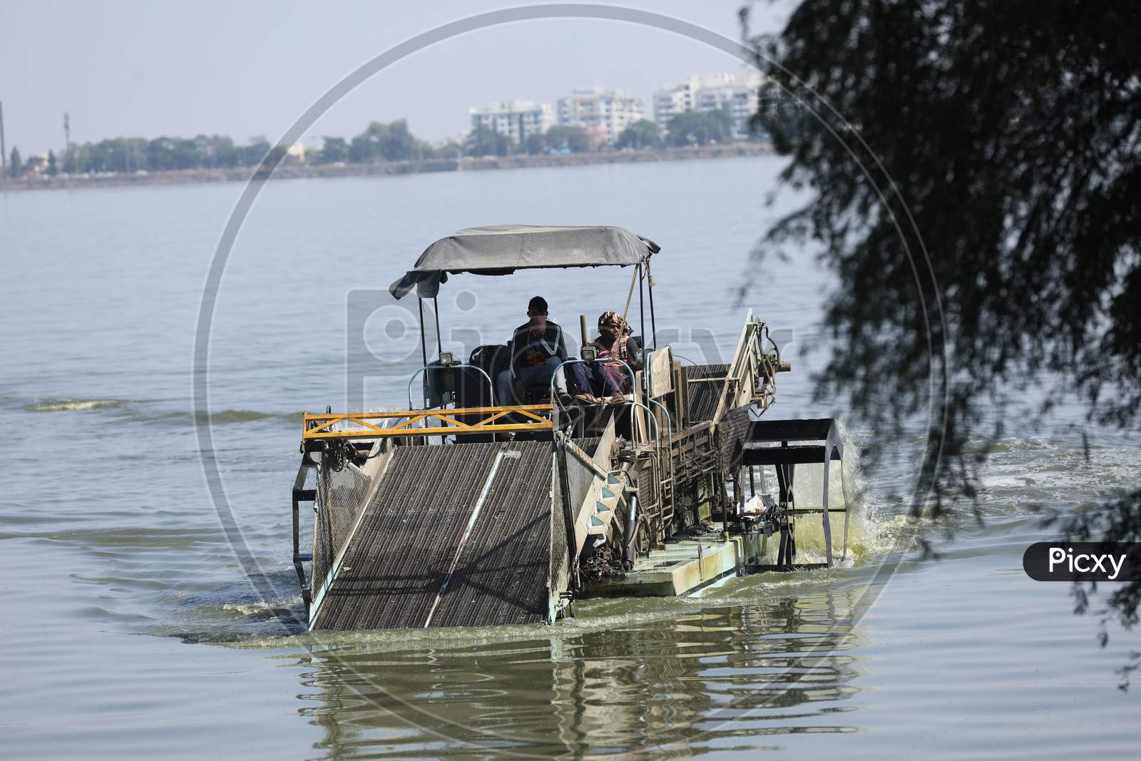 Floating Trash Collectors Machines In Hussain Sagar Lake