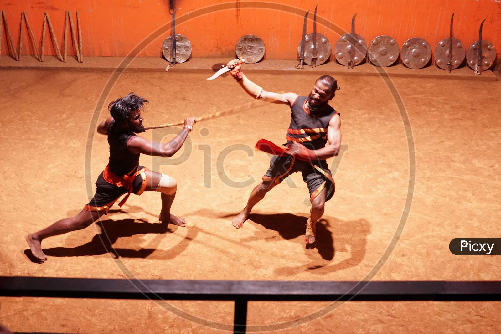 Indian men during stick fight in a ring