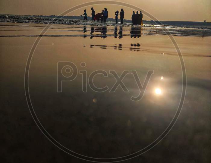 Silhouette Of Visitors in an  Beach