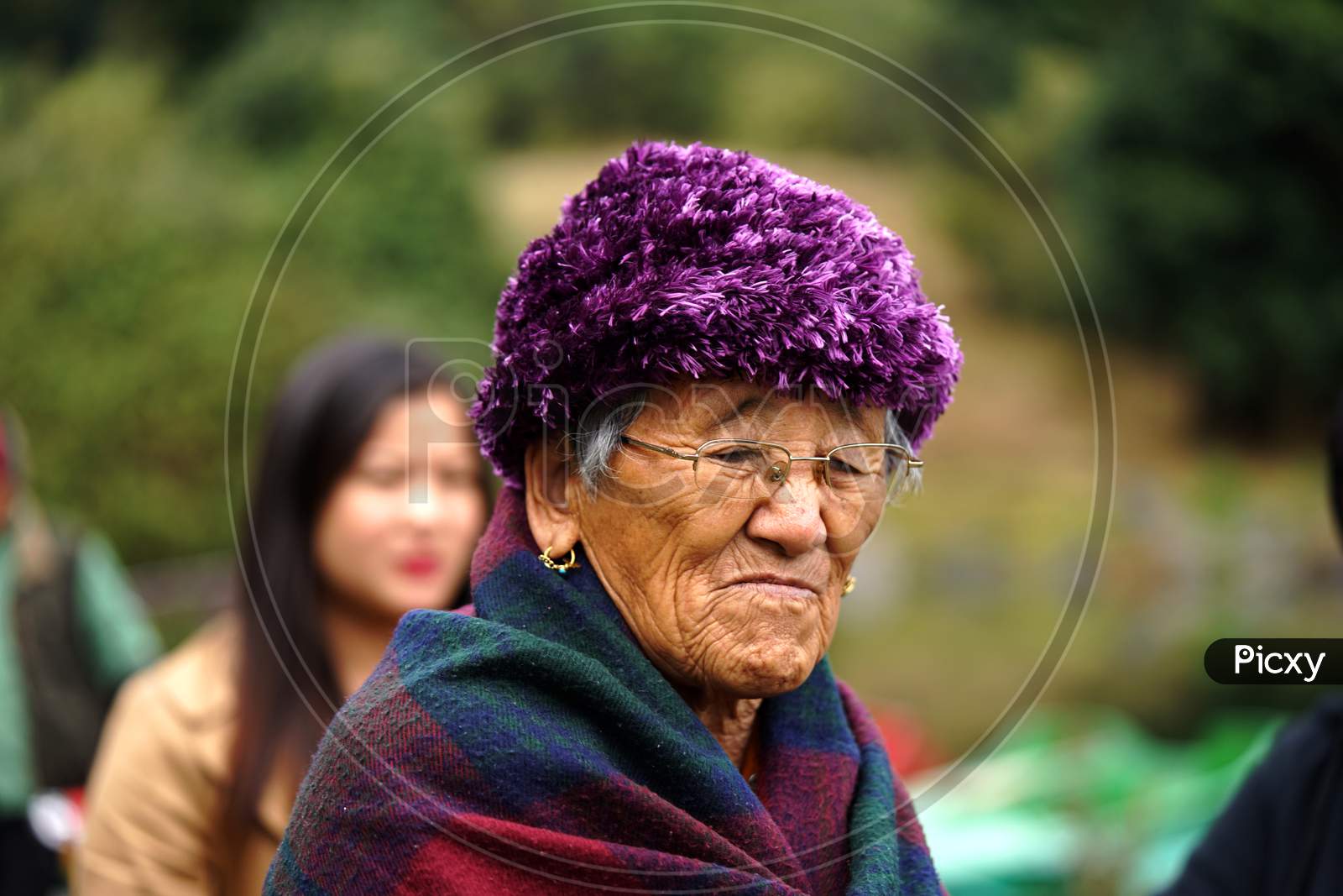 Nepal Old Woman with purple hair wig