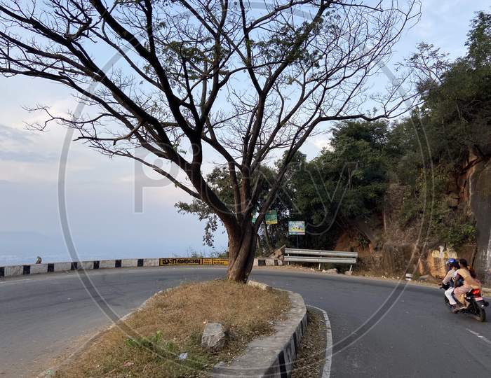 A Bike taking a turn along the ghat road