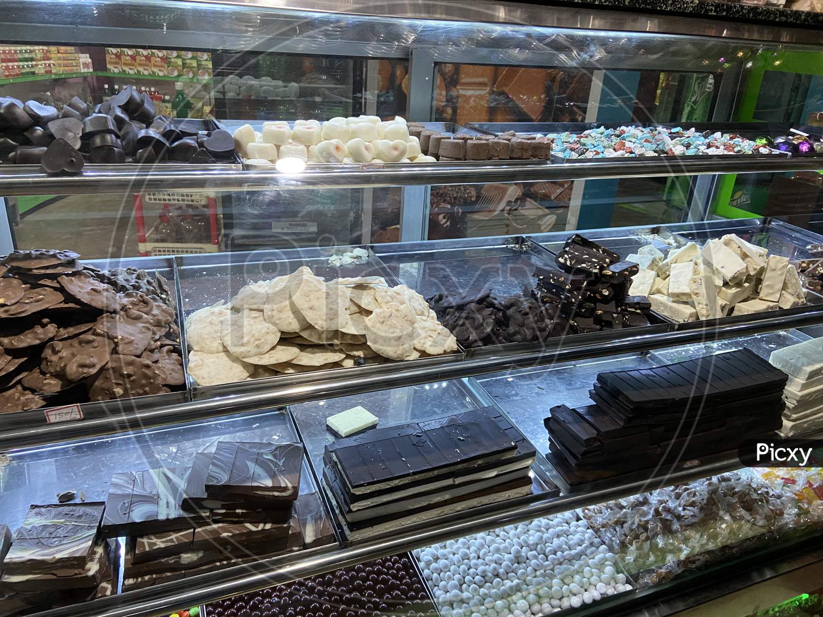 A display of homemade chocolates in a bakery