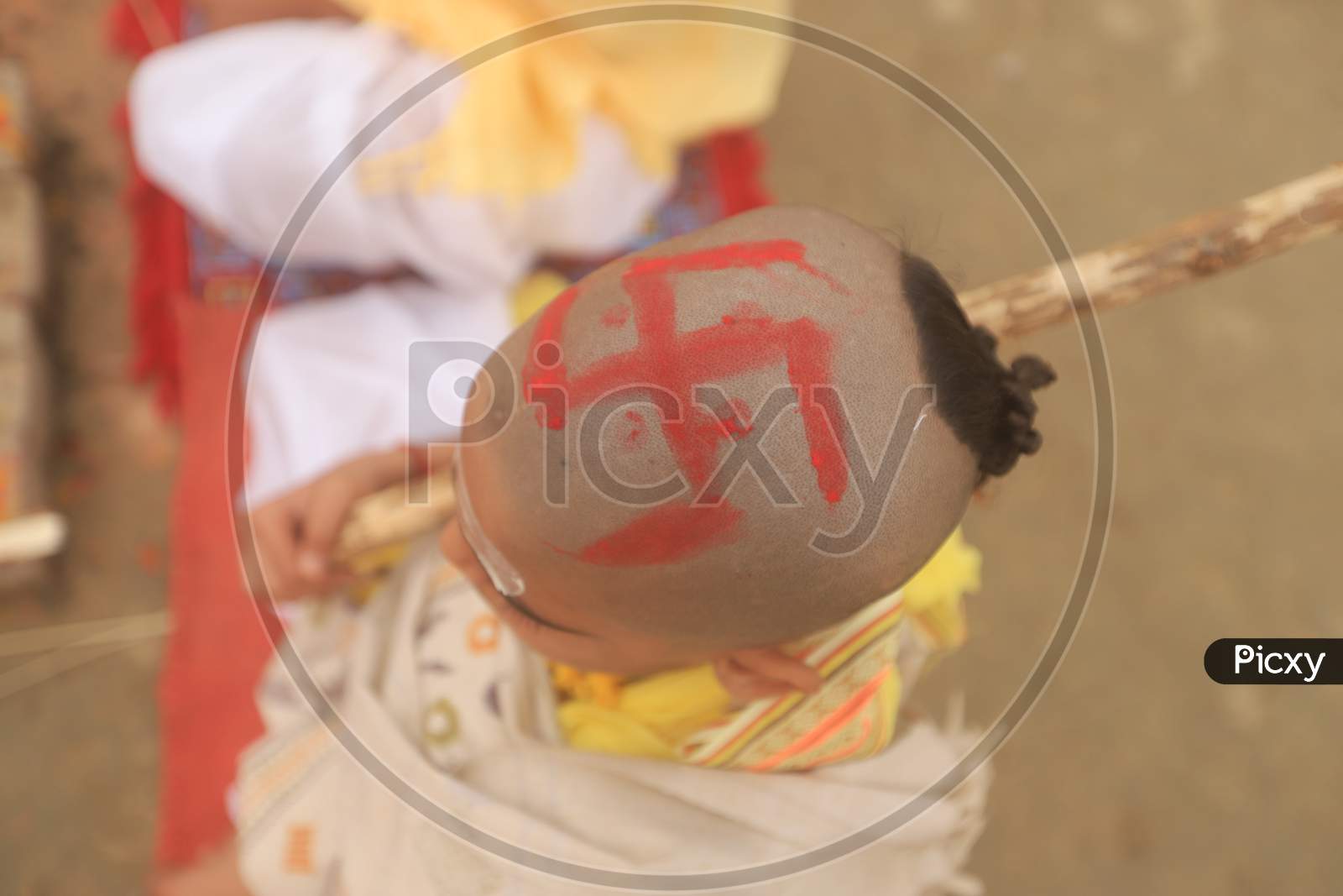 Hindu Priest Boy With Swasthik Symbol
