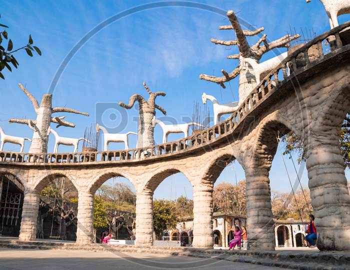 sculptures, structures and swings at rock garden chandigarh