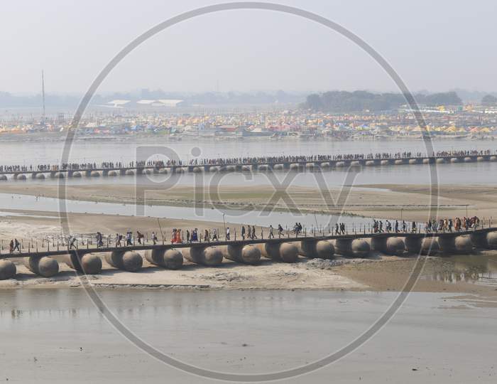 Devotees Arriving At Magh Mela  Crossing The Triveni Sangam Bridges In Prayagraj