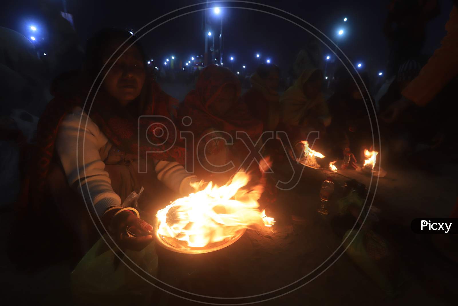 Devotees Performing Aarthi For Triveni Sangam River At Prayagraj During  Magh Mela 2020