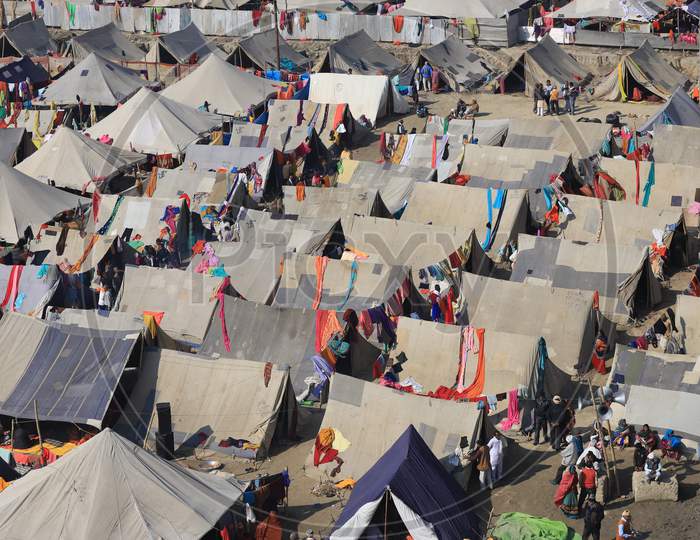 Aerial View of Tents And Pilgrims At Triveni Sangam River Bank During Prayagraj Magh Mela 2020