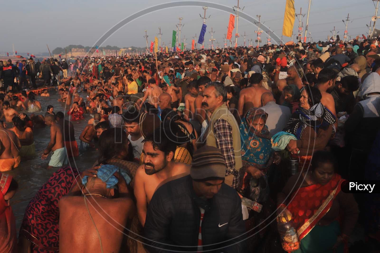 Image of Crowd of Hindu Devotees Taking Holy Bath In Triveni Sangam ...