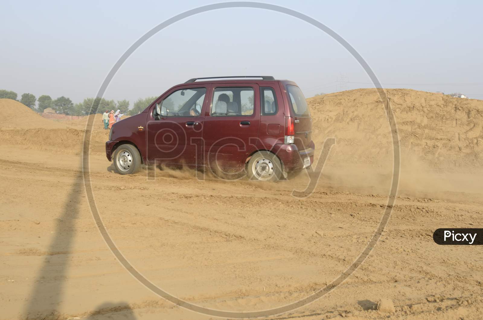 Suzuki WagonR Car Or  Off-Road Vehicle  in an Rally Championship  With Drifting And Sand and Soil  Splashes on Rally Tracks