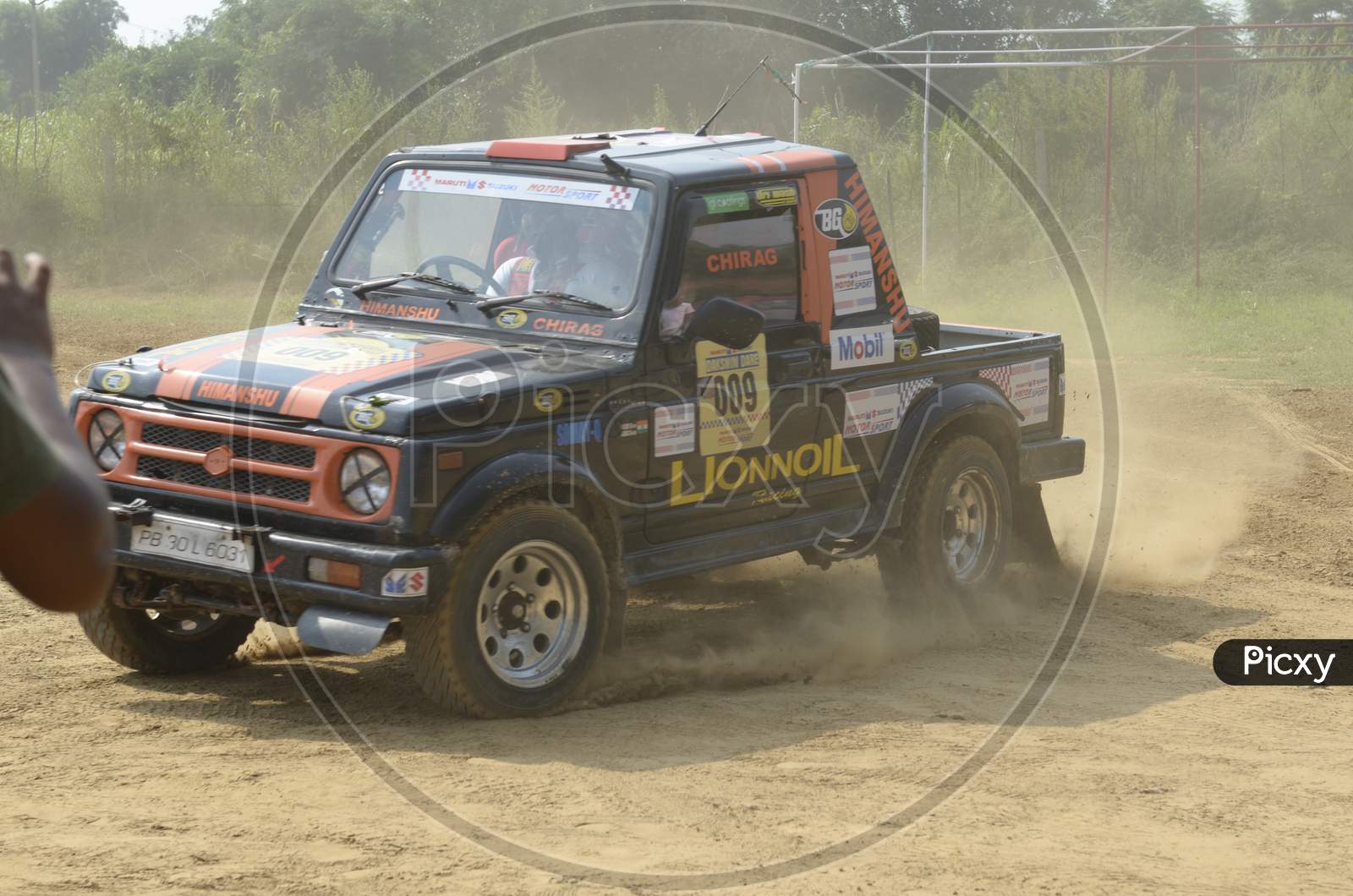 A Jeep drifting during rally race