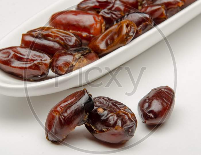 Dates Dry Fruit Or Date Palm Over White Background