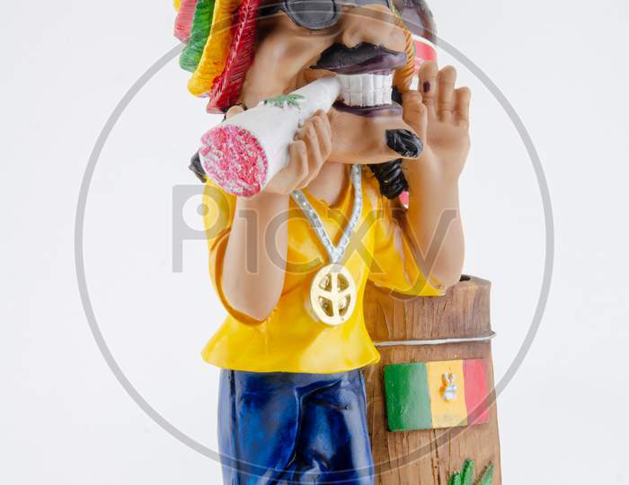 Action Figure or A Toy With Things Holder Over an Isolated White Background