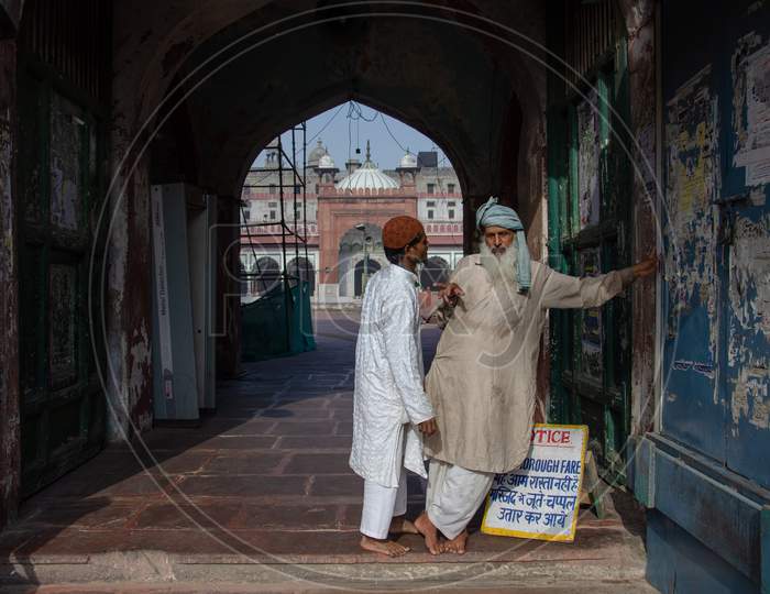 Two Indian Muslim Men having a conversation