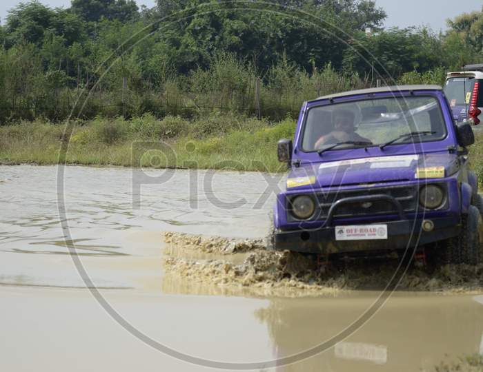 Off-roading of a Jeep during rally race