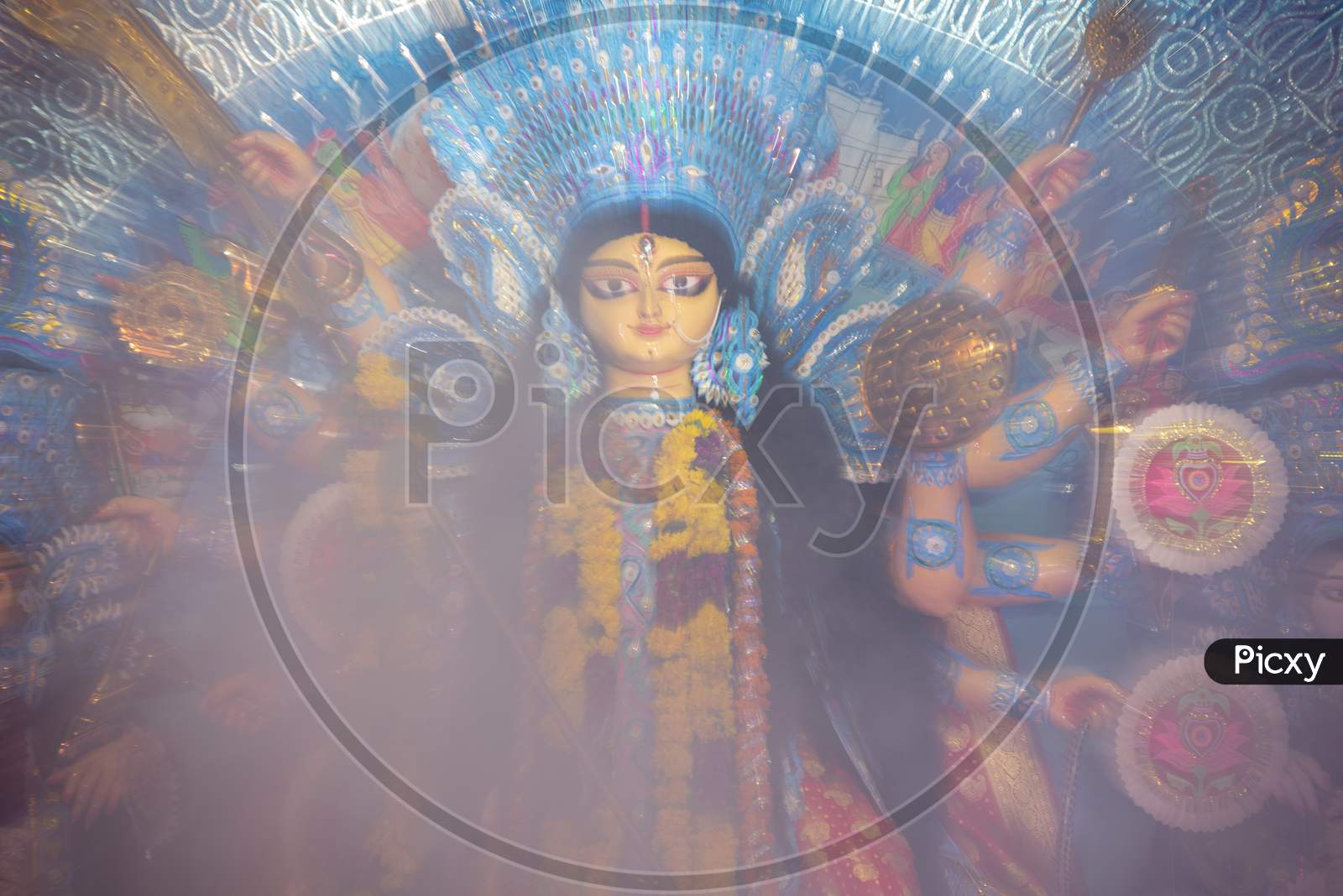 Goddess Durga Devi Statue covered in smoke during Dussehra