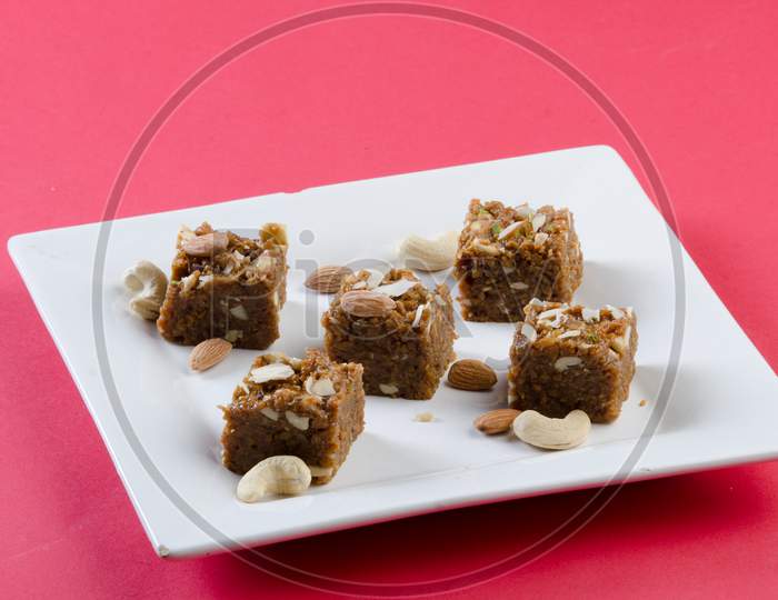 Indian Traditional Sweet   Kova Or Condensed Milk Cake   With Dry Nuts Topping