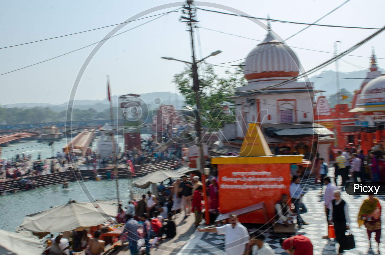 Haridwar With Ganges River Channel And Devotees Taking Holy Bath  In Gnaga River , Uttarakhand