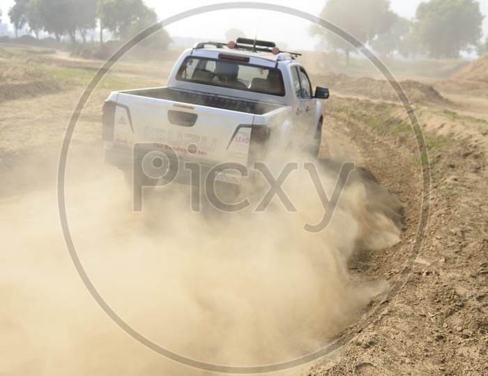 Car Off-Road in an Rally Championship  With Drifting And Sand and Soil  Splashes on Rally Tracks