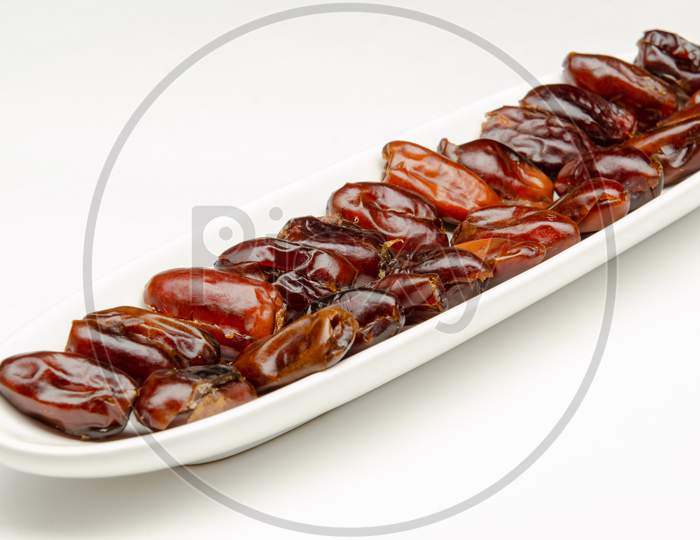 Dates Dry Fruit Or Date Palm Over White Background