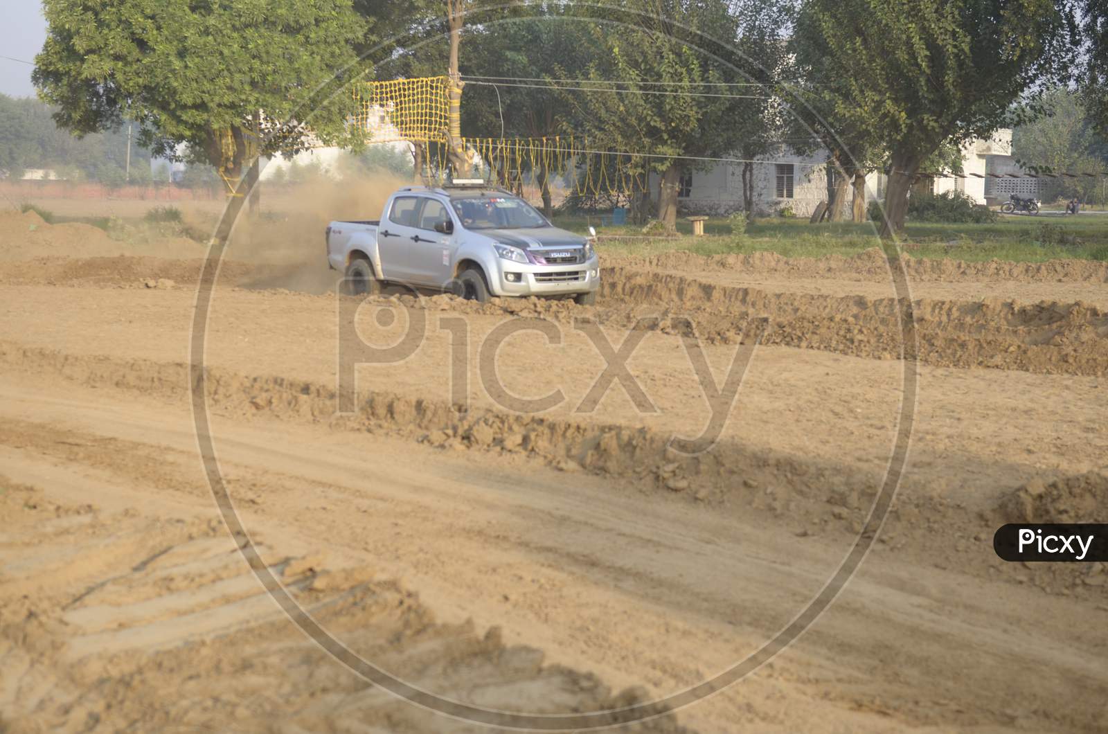View of Isuzu Maxo moving along the rally race