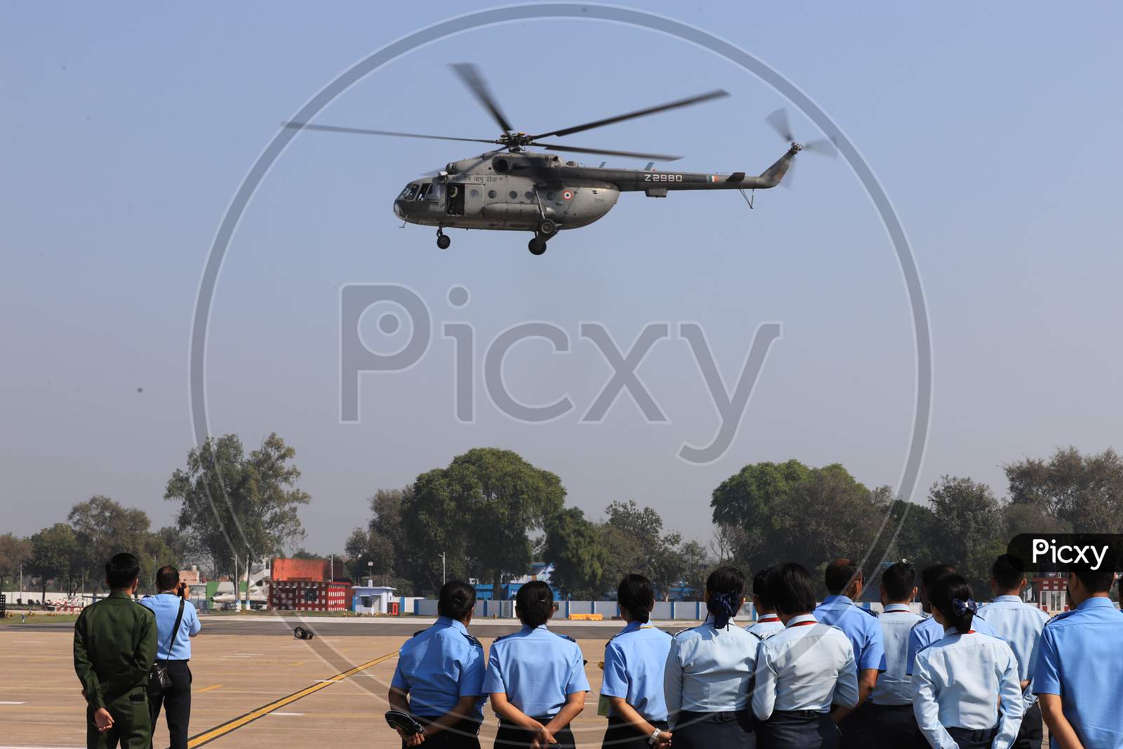 Air Force  Officers Demonstrating At An Air Base With New Helicopters