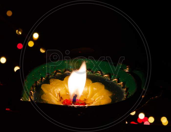 Diwali Dia With LED Bokeh Background
