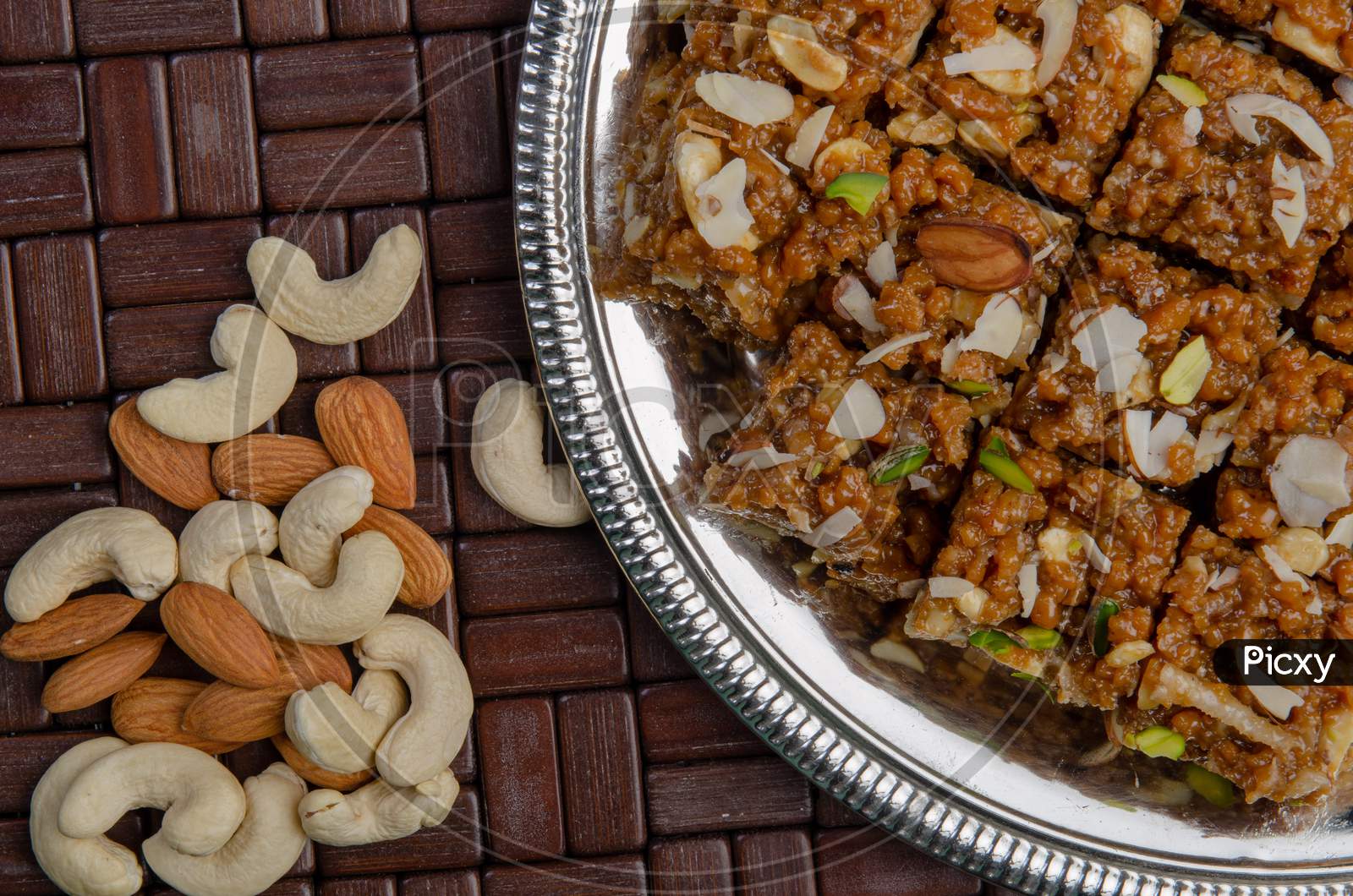 Indian Traditional Sweet  or Savory  Kova Or Condensed Milk Cake  With Dry Nuts Toppings