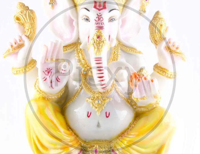 Indian Hindu God Lord Ganesh Idols Over An Isolated White Background