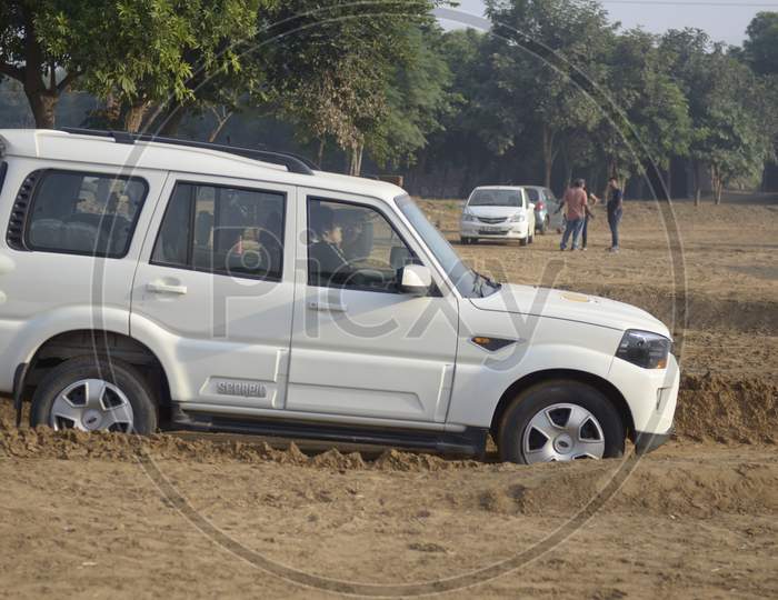 A SUV Car during the rally race in the dirt road