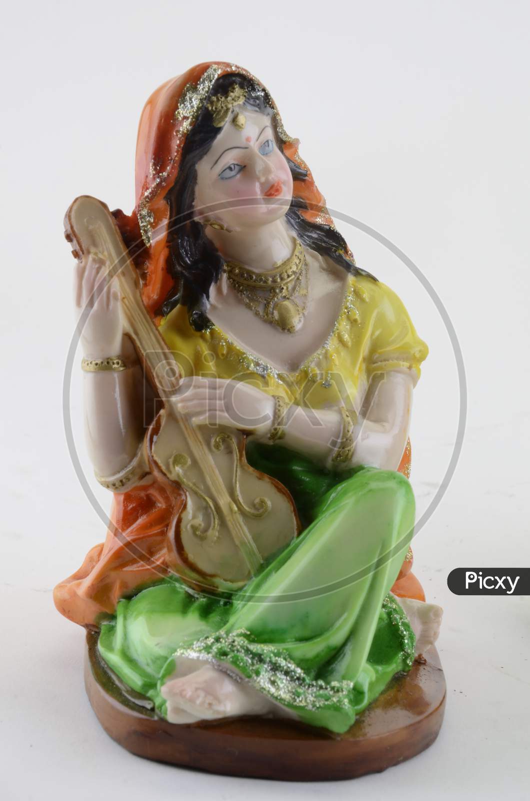 Action Figures Of Indian Traditional  Musicians Playing Instruments Over An Isolated White Background