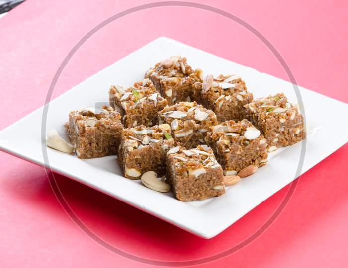 Indian Traditional Sweet   Kova Or Condensed Milk Cake   With Dry Nuts Topping